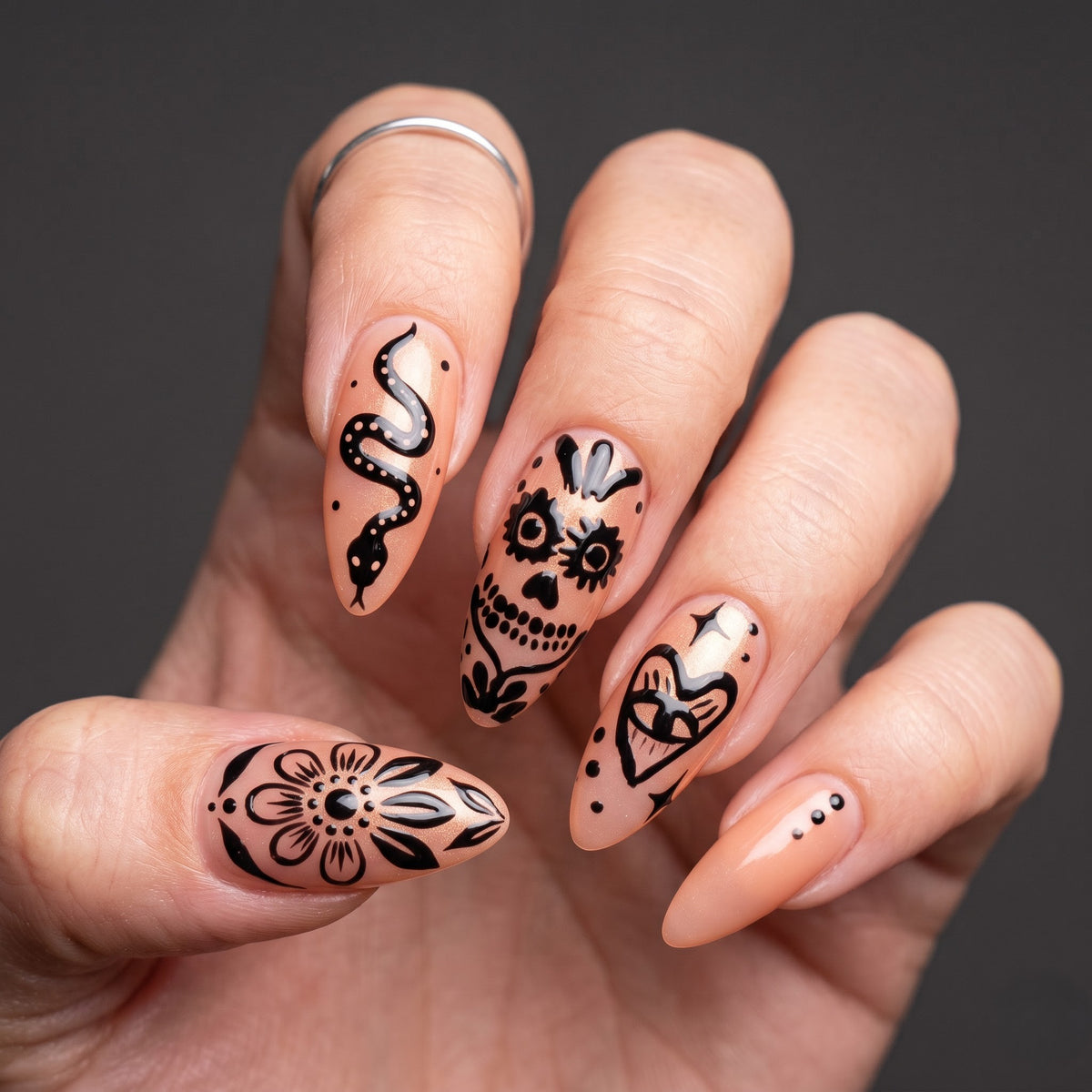 Black Ink Sugar Skull Press On Nails — Ink Grin | Hand-Painted Sheer Nude Almond Set