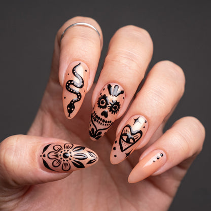 Black Ink Sugar Skull Press On Nails — Ink Grin | Hand-Painted Sheer Nude Almond Set